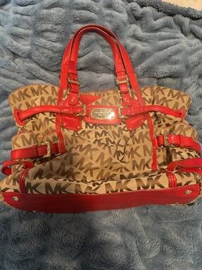 Michael Kors Brown MK Monogram Tote with Red Trim and Handles